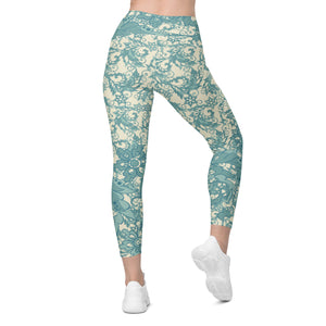 Teal Flowers and Swirls on Cream Crossover leggings with pockets