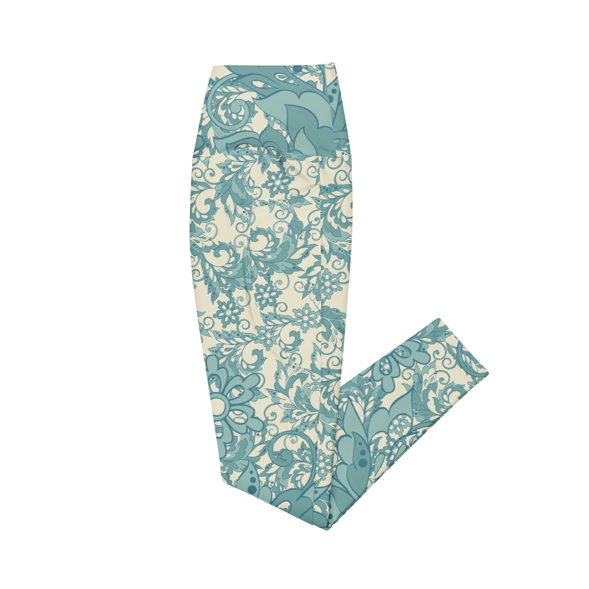 Teal Flowers and Swirls on Cream Crossover leggings with pockets