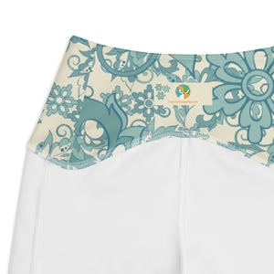 Teal Flowers and Swirls on Cream Crossover leggings with pockets